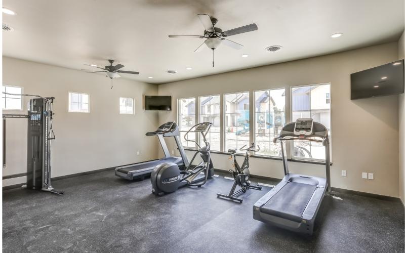 a gym with treadmills