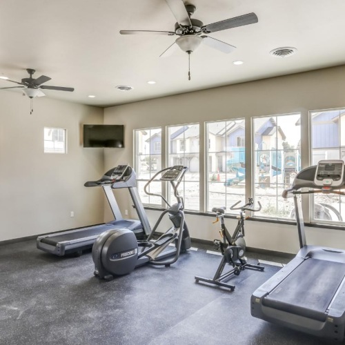 a gym with treadmills